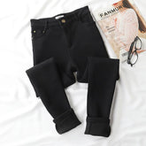 Vaqueros negros elásticos con interior de terciopelo cálido