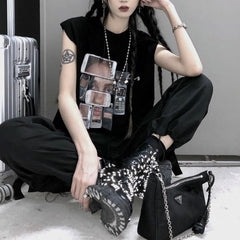 Camiseta holgada con estampado retro de celulares en blanco y negro