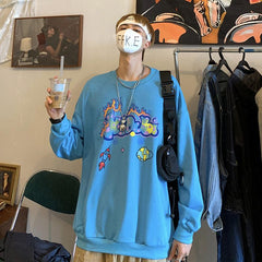 Sudadera holgada corta con estampado de burbujas en azul, negro y blanco
