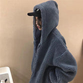 Chaqueta holgada con capucha de piel sintética rizada en azul y verde oscuro