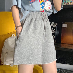 Pantalones cortos holgados y cómodos con cintura elástica y colores brillantes