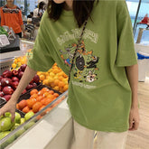 Camiseta holgada de cuello redondo con estampado de letras de dibujos animados