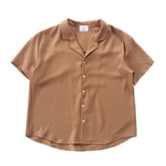 Blusa informal de manga corta con cuello en V y raya diplomática