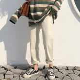 Pantalones casuales rectos de cintura alta con remangados