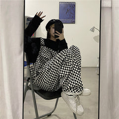 Mono holgado con bolsillos delanteros y diseño de cuadros estilo skater