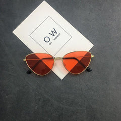 Gafas de sol grunge redondas y afiladas de colores