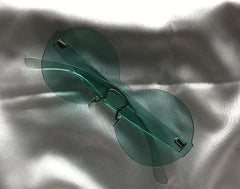 Gafas de sol redondas de plástico coloridas y modernas