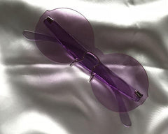 Gafas de sol redondas de plástico coloridas y modernas