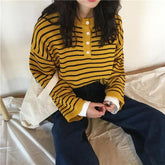 Suéter holgado de manga larga de punto con rayas en contraste