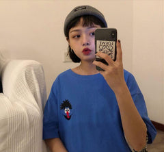 Camiseta extragrande colorida con estampado de dibujos animados