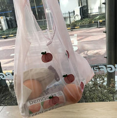 Bonita bolsa de compras fina de malla con frutas bordadas