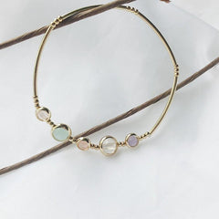 Bonita pulsera y anillo pequeños de metal dorado