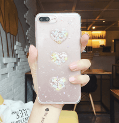 Bonita funda transparente con forma de corazón para iPhone en colores pastel