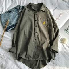 Blusa informal con bordados de bolsillo