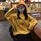 Suéter colorido con estética Tumblr de dinosaurios diminutos y lindos