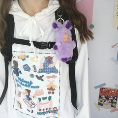 Weißer Oversize-Hoodie mit süßem Spielzeugmuster