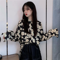 Blusa de gasa de manga larga con estampado de margaritas