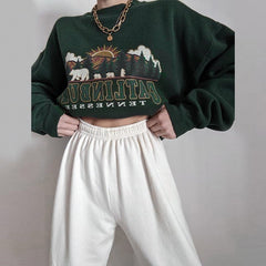 Dunkelgrünes lockeres Sweatshirt mit Vintage-Ästhetik-Print