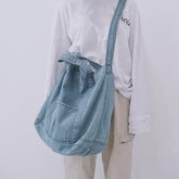 Bolso de hombro de lona vaquera azul claro y oscuro