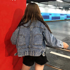 Chaqueta vaquera extragrande con bolsillos en la espalda