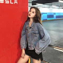 Chaqueta vaquera extragrande con bolsillos en la espalda