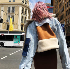 Chaqueta corta vaquera de piel con patchwork de diseñador