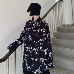 Camisa de manga larga grunge con estampado de huesos de dinosaurio