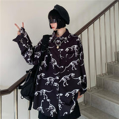 Camisa de manga larga grunge con estampado de huesos de dinosaurio
