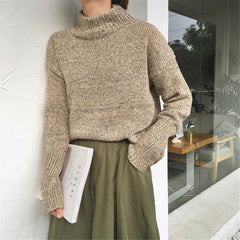 Suéter cálido y acogedor de punto en colores gris tierra