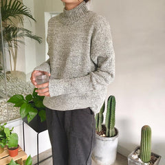 Suéter cálido y acogedor de punto en colores gris tierra