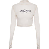 Top corto transparente de manga larga color albaricoque con estampado atrevido