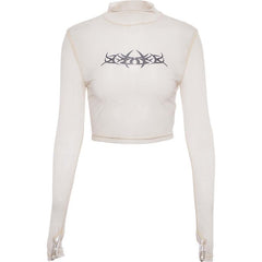 Top corto transparente de manga larga color albaricoque con estampado atrevido