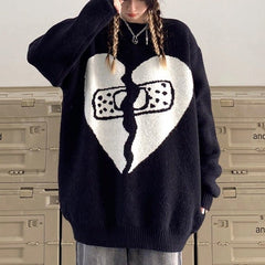 Suéter negro con corazón roto de estética Egirl
