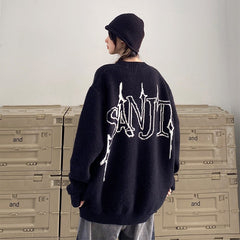 Suéter negro con corazón roto de estética Egirl