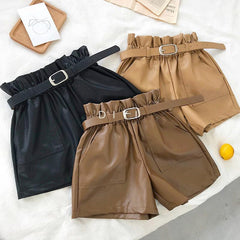 Pantalones cortos de cuero sueltos con cintura elástica y doble bolsillo