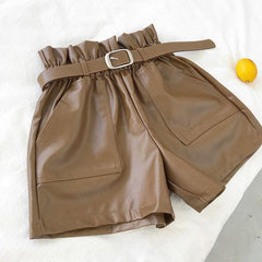 Pantalones cortos de cuero sueltos con cintura elástica y doble bolsillo