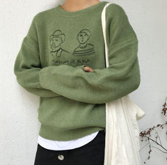 Suéter de punto con cuello redondo, bordado en amarillo, verde y negro