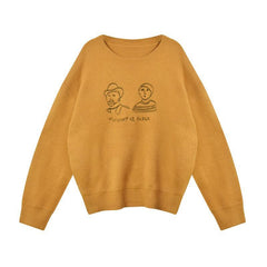 Suéter de punto con cuello redondo, bordado en amarillo, verde y negro