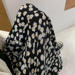 Falda larga holgada negra de cintura alta con estampado de flores