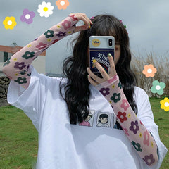 Guantes transparentes con estampado de flores