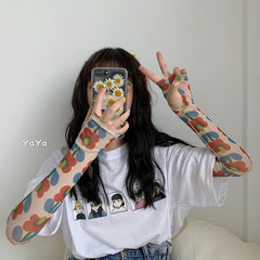 Guantes transparentes con estampado de flores