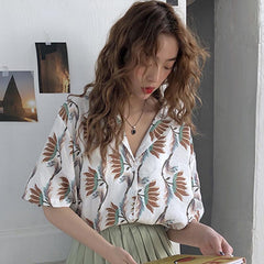 Camisa holgada con botones y estampado de flores de verano