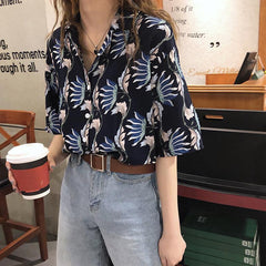 Camisa holgada con botones y estampado de flores de verano