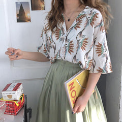 Camisa holgada con botones y estampado de flores de verano