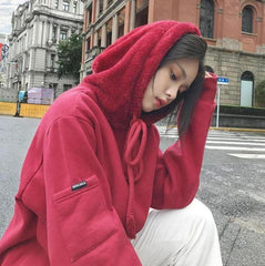 Sudadera extragrande de color liso con capucha de piel esponjosa