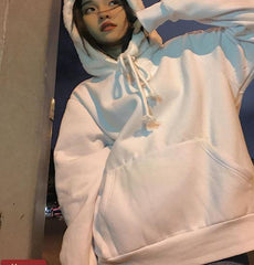 Sudadera extragrande de color liso con capucha de piel esponjosa