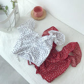 Top veraniego de lunares blancos con volantes