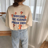 Camiseta holgada de cuello redondo con estampado de dibujos animados y letras divertidas