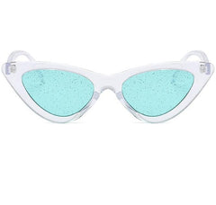 Gafas de sol con montura de plástico estilo gato y lentes transparentes con purpurina