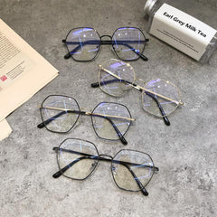 Gafas con montura hexagonal de metal fino y brillante, estilo vintage